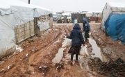 Refugee Child During Snowfall