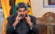Maduro gives a speech from a desk
