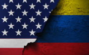 US and Colombian flags painted on a wall